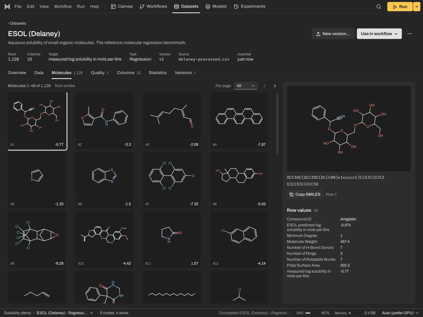 A molecule drawn from its SMILES string next to the dataset table in AI Maestro.